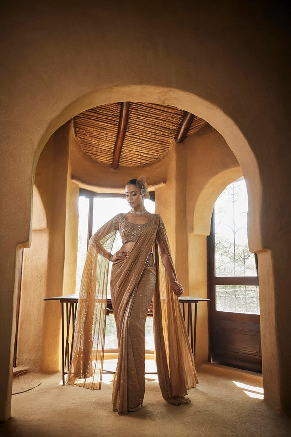 Beige gold tissue drape sari set with cape sleeve blouse and pre daped sari